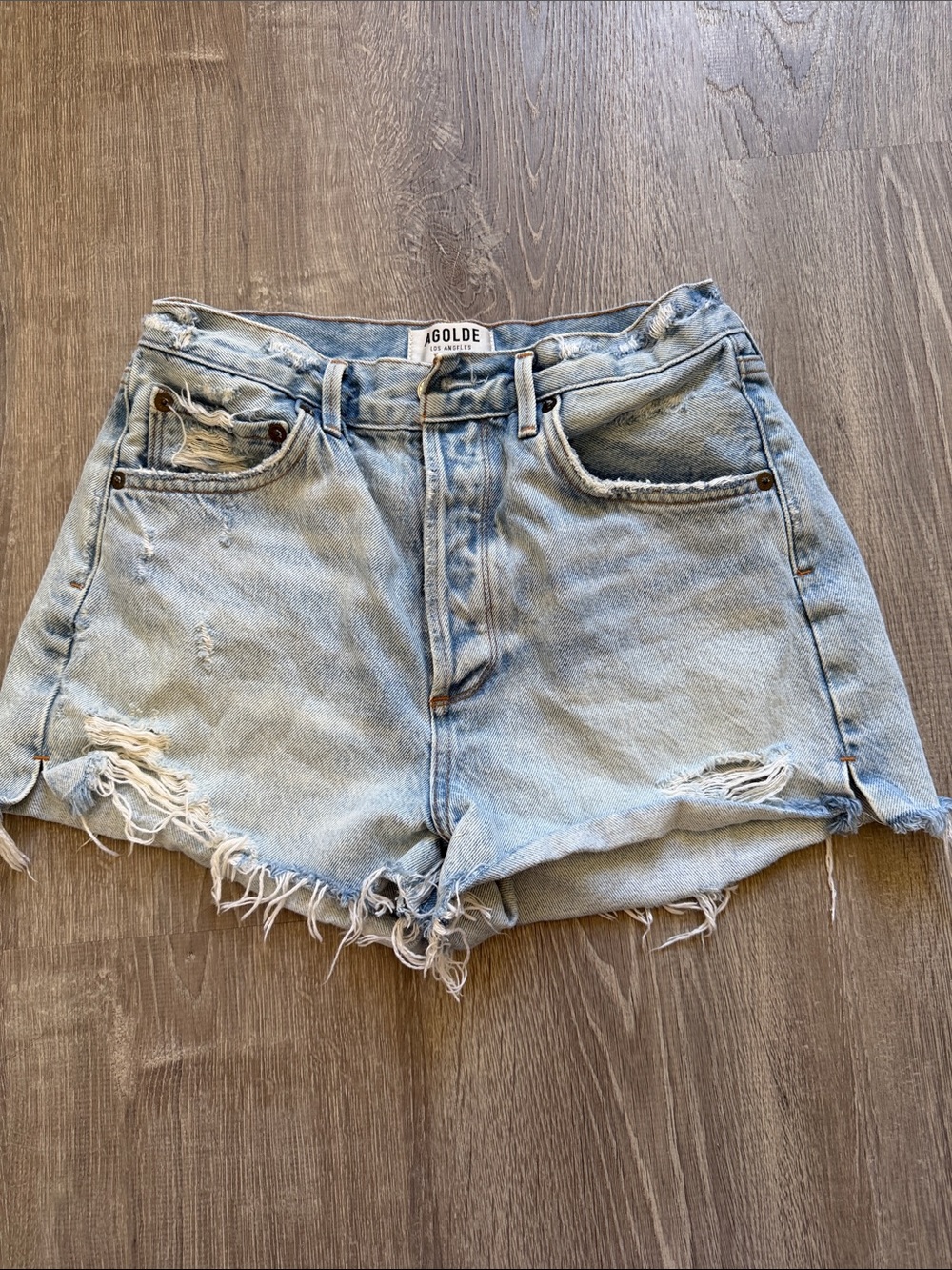 Agolde Light Wash Distressed Denim Cutoff Shorts
